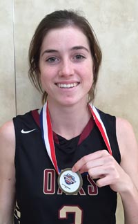 Katie Campbell of Oaks Christian shows off some of the honors she collected at the West Coast Jamboree. Photo: Harold Abend.