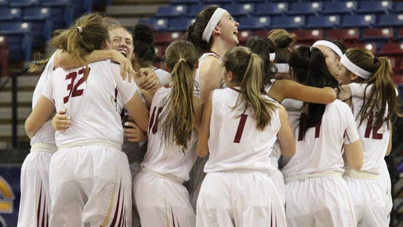 It's celebration time for Cardinal Newman girls after state title win. Photo: Willie Eashman.