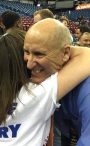 St. Joseph Notre Dame head coach Don Lippi gets a hug moments after his team won CIF Division V state crown. Photo: Mark Tennis.