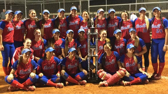 The Los Alamitos softball team collected a large trophy for winning major tournament over the weekend in Bullhead City, Ariz. Photo: @LosAl_Softball.