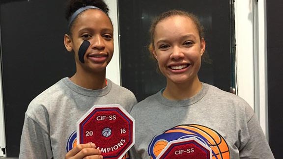 Leaonna Odom (left) and Valerie Higgins show off their patches after Chaminade won CIF Southern Section Open Division title. Photo: Harold Abend.