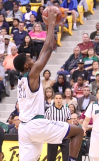 Onyeka Okongwu, one of two freshman starters for Chino Hills, goes up for dunk against Bishop Montgomery. Photo: Andrew Drennen.