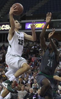 De La Salle's Jordan Ratinho is challenged during CIF Open Division state final by Chino Hills freshman Onyeka Okongwu. Photo: Willie Eashman.