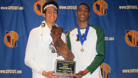 Tydus Verhoeven and Kenny Wooten hold CIF Division III state championship plaque won on Thursday by Manteca. Photo: Ronnie Flores.