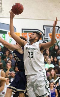 Anand Hundal was one of three starters at 6-7 or taller that gave opponents of CIF D3 state champ Manteca tons of problems. Photo: John Westberg/The Modesto Bee.