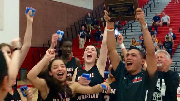 Village Christian head coach Jon Sampang (far right) holds plaque after his team won CIF Southern California Division V championship on March 19. Photo: Twitter.com.