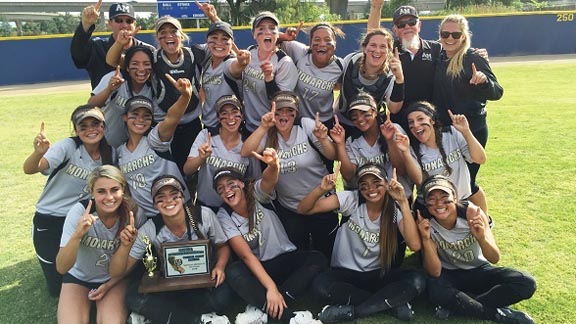 Archbishop Mitty softball players go a little nuts after receiving 2016 CIF Central Coast Section Division II championship trophy. Photo: Harold Abend.