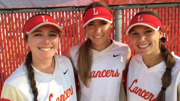 Three of the leading players for No. 1 Orange Lutheran smiling on senior day are Amelia Van Orman, Maddie Dwyer and Mackenzie Boesel. Photo: Harold Abend.