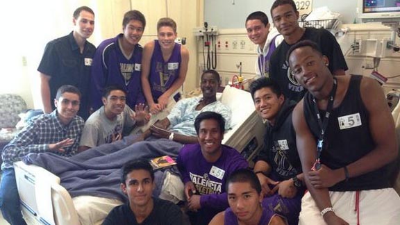 Valencia High's Chibozo Ikonte is shown in 2014 recovering in local hospital with kids who helped save him from sudden cardiac arrest. Photo: jstudentboard.com.