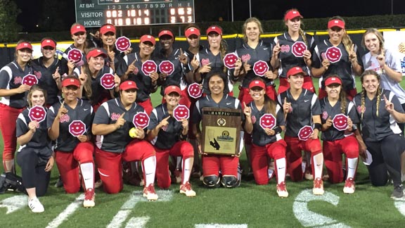 Mater Dei of Santa Ana girls softball team gets patches and plaque after upset win over No. 1 state-ranked Orange Lutheran on Saturday in Irvine. Photo: Harold Abend.