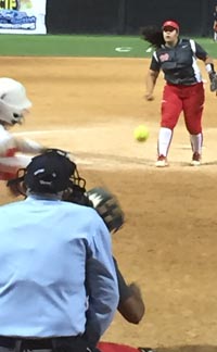 Mater Dei's Gabby Sandoval watches as one of her pitches gets close to Orange Lutheran batter during Saturday's CIFSS Division I softball final. Photo: Brentt Eads/FloSportsSoftball.