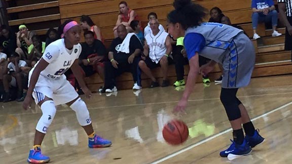 Charisma Osborne of the Cal Sparks and L.A. Windward (9th grader last season) matches up against Te-Hina Paopao of the Wiggins Waves and La Jolla Country Day (will the 9th grader this season) last week at Cal-State Dominguez Hills. Photo: Harold Abend.