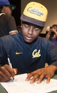 Jaylinn Hawkins signs letter of intent during ceremony at Buena Park last February. There should be another large group signing this February. Photo: hometeamsonline.com.