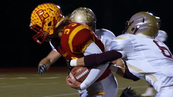 Noah Cryns of Pacific Grove struggles for yards during team's win over Scotts Valley in 2015 CIF Central Coast Section D3 semifinals. Photo: Leticia Ferreira/pgnewsbreaker.com.