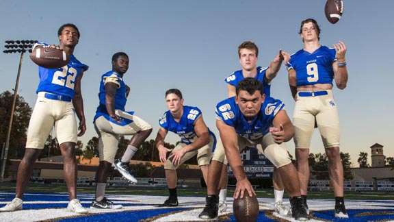 This group of Santa Margarita players, including Malone Mataele (22) and Grant Calcaterra (9), is up to No. 19 in this week's state rankings. Photo: @SMCHS_Football/Twitter.com.