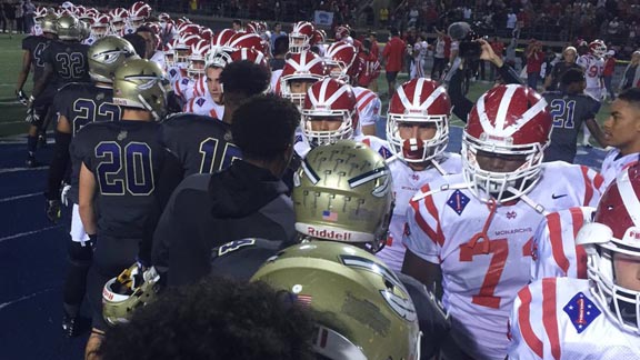Mater Dei of Santa Ana and St. John Bosco of Bellflower players go through handshake line after Friday's game at Cerritos College. Photo: @BoscoFootball/Twitter.com.
