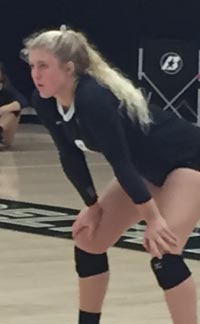 Julia Devine is a 6-foot-2 junior middle blocker for No. 2 Mitty. Photo: Mark Tennis.