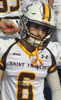 It looks like St. Francis DB Patrick Calcagno is getting charged up like a phone before taking the field in game vs. Bellarmine. Photo: Mark Tennis.