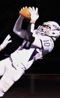 Last year, Fort Bragg's Lucas Triplett was known for some amazing catches (like this one). This year, he's the one playing quarterback. Photo: Brittaney Dondanville.