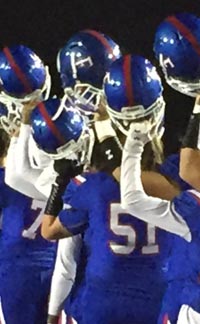 Folsom players raise their helmets before start of their game on Friday vs. Sheldon of Sacramento. Photo: Twitter.com.