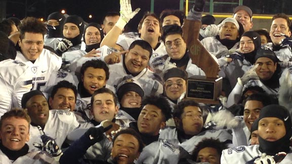It wasn't that cold for St. John Bosco's players when they got cozy after CIF Open Division state final win over De La Salle. Photo: Paul Muyskens.
