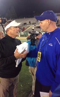 St. Mary's head coach Tony Franks and Folsom head coach Kris Richardson greet each other after Saturday's game at Sac State. Photo: Paul Muyskens.