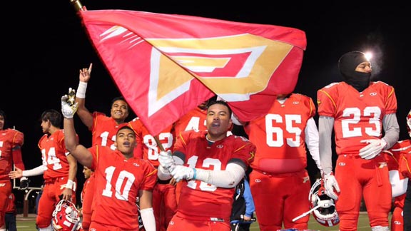 K.J. Latu (No. 10), chosen as our MVP of the CIF D3-AA state final, was part of flag-waving celebration after Paraclete topped Menlo-Atherton. Photo: @ParacleteFB/Twitter.com.